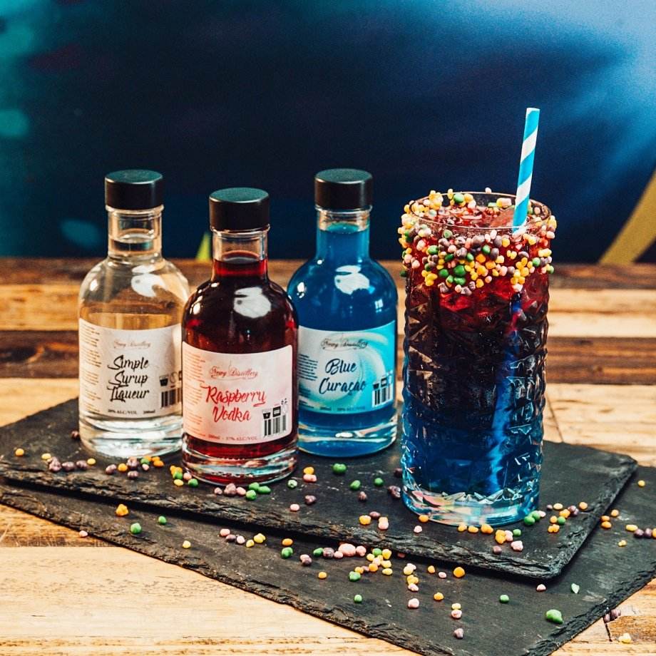 Fruit tingle Cocktail Kit by Newy distillery. 3x 200ml bottles and fruit tingle cocktail decorated with nerds!