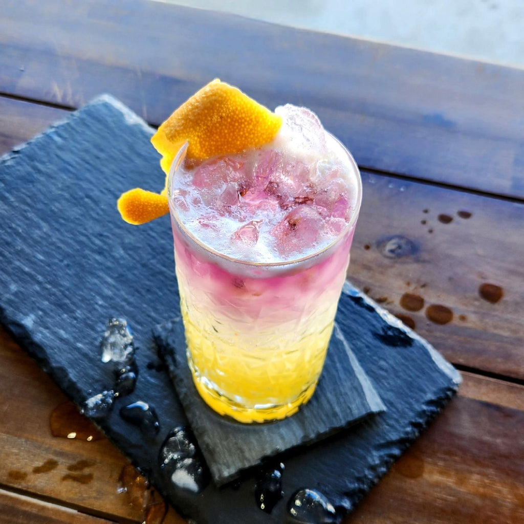 Purple Gin Pineapple and Passionfruit Collins
