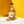 Load image into Gallery viewer, Newy Distillery Honeycomb Vodka. Honeycomb flavoured vodka, with golden shimmer. Bottle on white with yellow background with honeycomb biscuits. Golden vodka.
