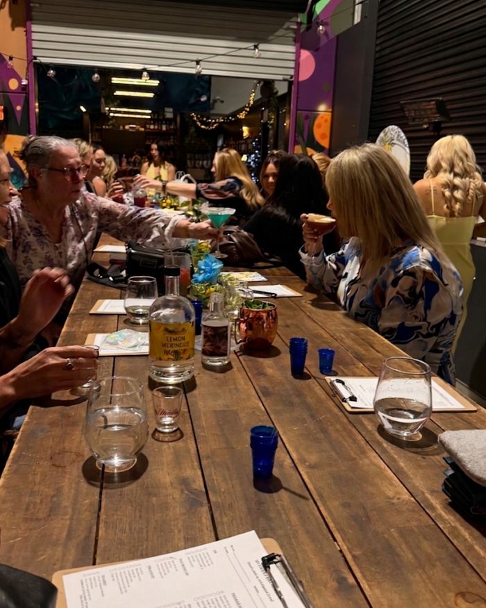 A cocktail class along the shared table
